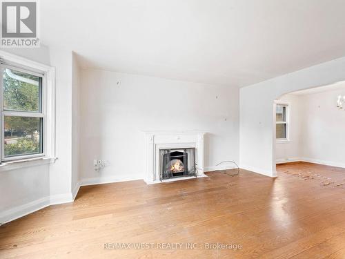 4 Allen Avenue, Toronto, ON - Indoor Photo Showing Living Room With Fireplace