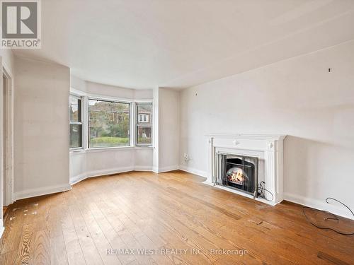 4 Allen Avenue, Toronto, ON - Indoor Photo Showing Living Room With Fireplace