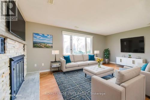 Lower U - 62 Third Line, Oakville, ON - Indoor Photo Showing Living Room With Fireplace