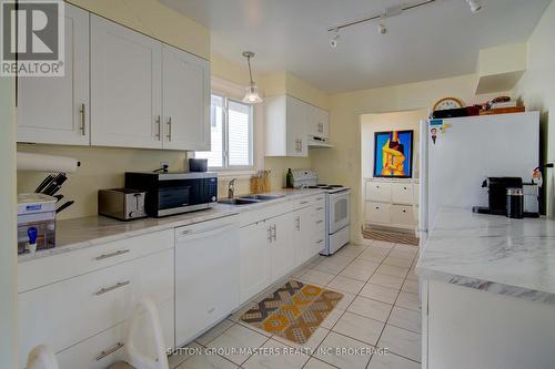 1097 Pinewood Place, Kingston (City Northwest), ON - Indoor Photo Showing Kitchen With Double Sink