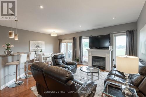 22 - 1630 Bayswater Crescent, London, ON - Indoor Photo Showing Living Room With Fireplace