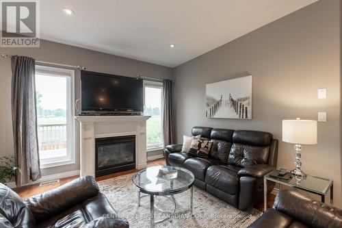 22 - 1630 Bayswater Crescent, London, ON - Indoor Photo Showing Living Room With Fireplace