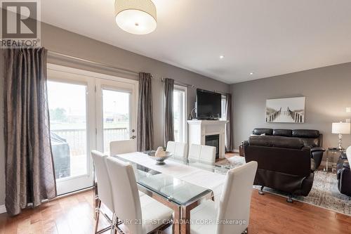 22 - 1630 Bayswater Crescent, London, ON - Indoor Photo Showing Dining Room With Fireplace