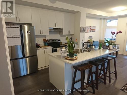 7 Hughes Lane, New Tecumseth, ON - Indoor Photo Showing Kitchen With Stainless Steel Kitchen