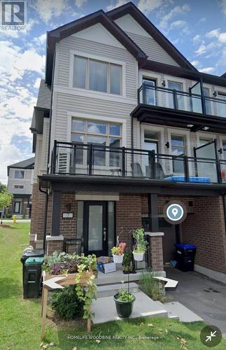 7 Hughes Lane, New Tecumseth, ON - Outdoor With Balcony With Facade