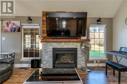 733 Chartersville, Dieppe, NB - Indoor Photo Showing Living Room With Fireplace