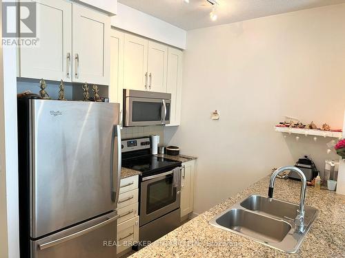 4403 - 4070 Confederation Parkway, Mississauga, ON - Indoor Photo Showing Kitchen With Double Sink