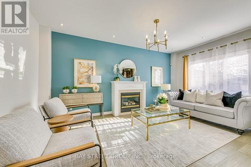 1034 Agram Drive, Oakville, ON - Indoor Photo Showing Living Room With Fireplace