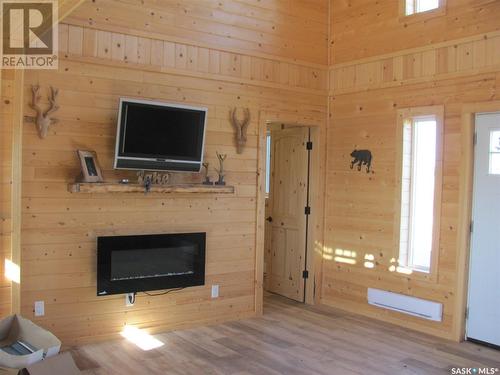 701 Pfeffer Avenue, Elbow, SK - Indoor Photo Showing Living Room With Fireplace