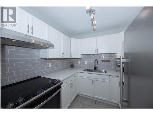 3155 De Montreuil Court Unit# 301, Kelowna, BC - Indoor Photo Showing Kitchen With Upgraded Kitchen