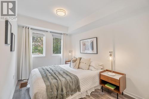 #105 - 50 Merchant Lane, Toronto, ON - Indoor Photo Showing Bedroom