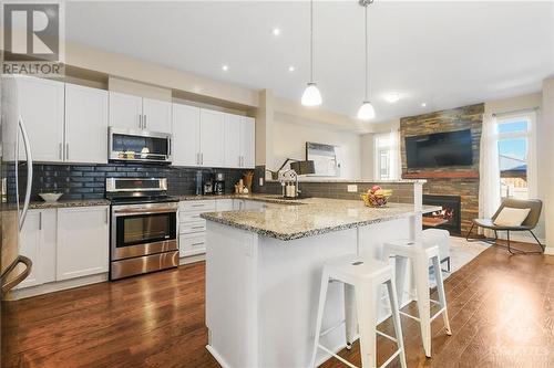 523 Knotridge Street, Ottawa, ON - Indoor Photo Showing Kitchen With Fireplace With Double Sink With Upgraded Kitchen