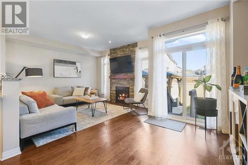 523 Knotridge Street, Ottawa, ON - Indoor Photo Showing Living Room With Fireplace