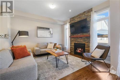 523 Knotridge Street, Ottawa, ON - Indoor Photo Showing Living Room With Fireplace