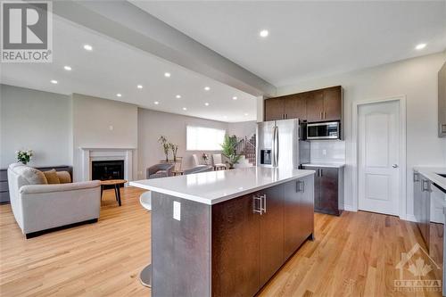 868 Snowdrop Crescent, Ottawa, ON - Indoor Photo Showing Kitchen With Fireplace With Upgraded Kitchen