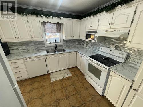 7 Kings Road, Bishop'S Falls, NL - Indoor Photo Showing Kitchen With Double Sink