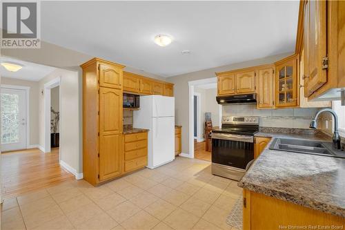 41 Wanda Crescent, Rothesay, NB - Indoor Photo Showing Kitchen With Double Sink