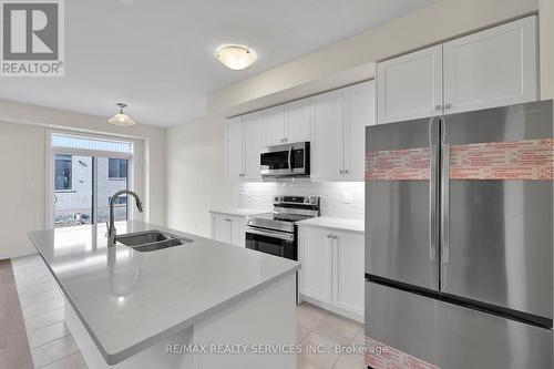 145 Keelson Street, Welland, ON - Indoor Photo Showing Kitchen With Stainless Steel Kitchen With Double Sink