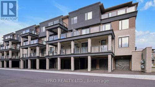 25 Knotsberry Circle, Brampton, ON - Outdoor With Balcony With Facade