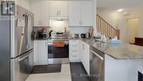 25 Knotsberry Circle, Brampton, ON - Indoor Photo Showing Kitchen With Double Sink