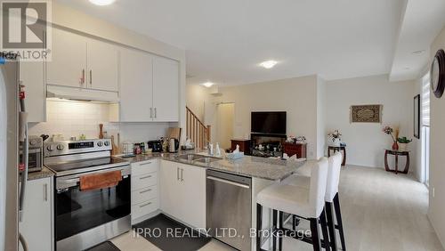 25 Knotsberry Circle, Brampton, ON - Indoor Photo Showing Kitchen With Double Sink