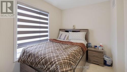 25 Knotsberry Circle, Brampton, ON - Indoor Photo Showing Bedroom