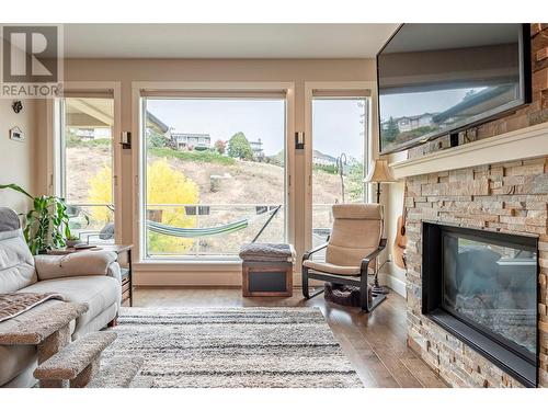 237 Kicking Horse Place, Vernon, BC - Indoor Photo Showing Living Room With Fireplace