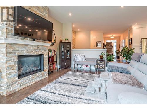 237 Kicking Horse Place, Vernon, BC - Indoor Photo Showing Living Room With Fireplace