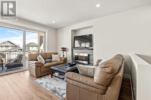 1274 Bergamot Avenue, Kelowna, BC - Indoor Photo Showing Living Room With Fireplace