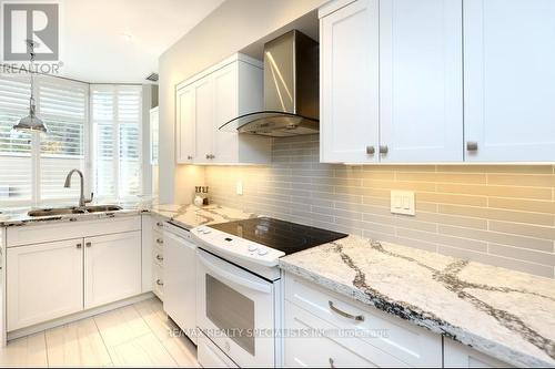 109 - 1700 The Collegeway Way, Mississauga, ON - Indoor Photo Showing Kitchen With Double Sink With Upgraded Kitchen