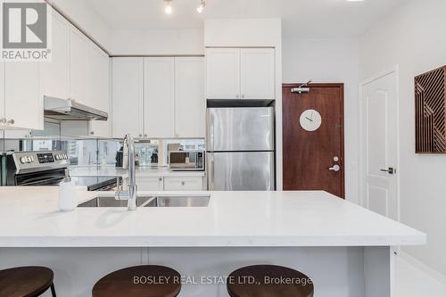 714 - 555 Yonge Street, Toronto, ON - Indoor Photo Showing Kitchen With Double Sink