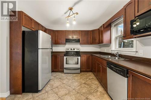 131 Fortune, Dieppe, NB - Indoor Photo Showing Kitchen With Double Sink