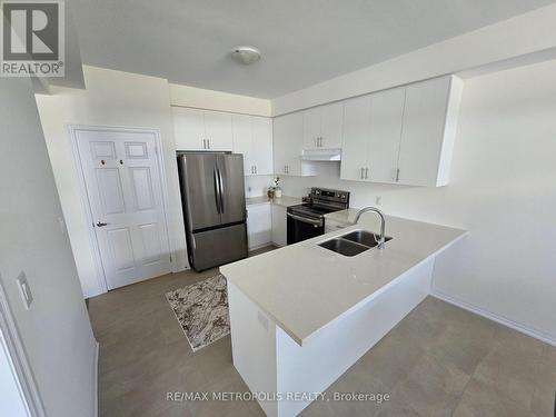 10 Ed Ewert Avenue, Clarington, ON - Indoor Photo Showing Kitchen With Double Sink