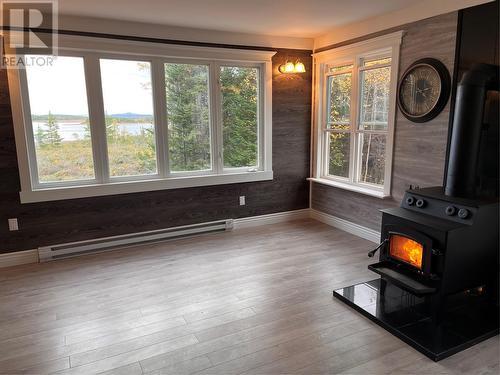 H Partridge Berry Point, Howley, NL - Indoor With Fireplace