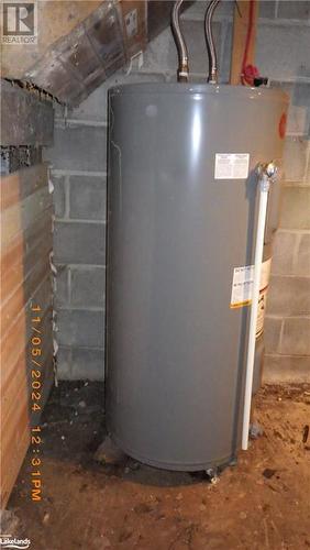 Utilities featuring electric water heater - 109 Blackstone Crane Lake Road, Seguin, ON - Indoor Photo Showing Basement