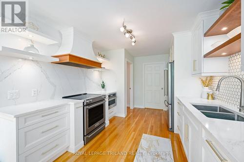 16 - 1502 Warbler Woods Walk, London, ON - Indoor Photo Showing Kitchen With Double Sink With Upgraded Kitchen