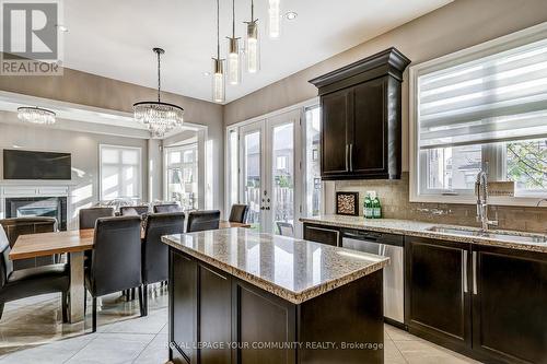 105 Burns Boulevard, King, ON - Indoor Photo Showing Kitchen With Fireplace With Double Sink