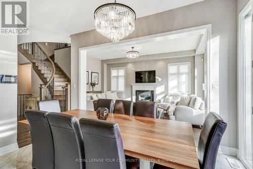 105 Burns Boulevard, King, ON - Indoor Photo Showing Dining Room With Fireplace