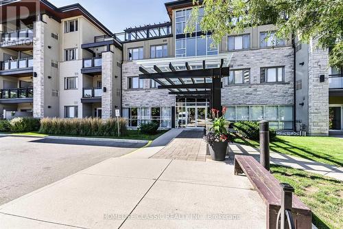 203 - 570 Lolita Gardens, Mississauga, ON - Outdoor With Balcony With Facade