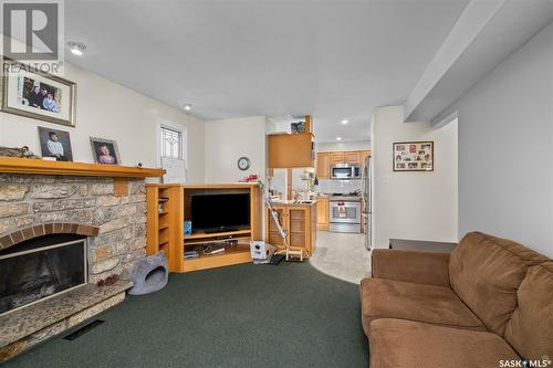 928 Sanderson Crescent, Prince Albert, SK - Indoor Photo Showing Living Room With Fireplace