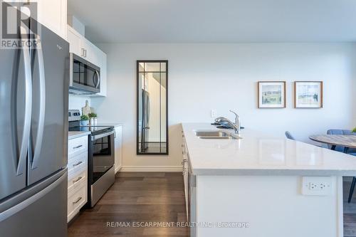 210 - 2620 Binbrook Road E, Hamilton, ON - Indoor Photo Showing Kitchen With Double Sink