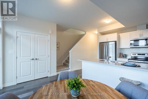 210 - 2620 Binbrook Road E, Hamilton, ON - Indoor Photo Showing Kitchen With Double Sink