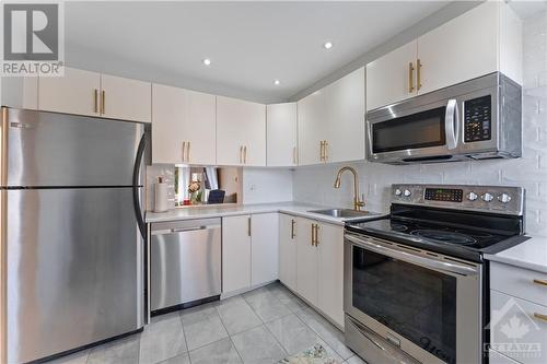 911 Elmsmere Road Unit#B, Ottawa, ON - Indoor Photo Showing Kitchen With Stainless Steel Kitchen With Upgraded Kitchen