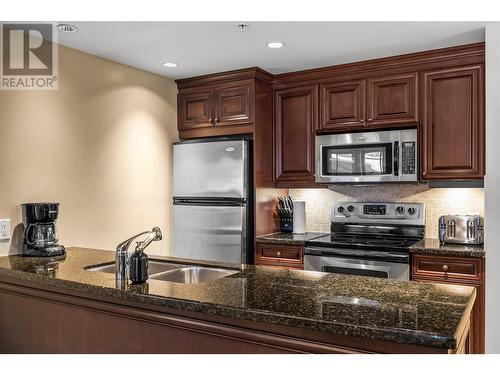 3250 Village Way Unit# 1407C, Sun Peaks, BC - Indoor Photo Showing Kitchen With Stainless Steel Kitchen With Double Sink