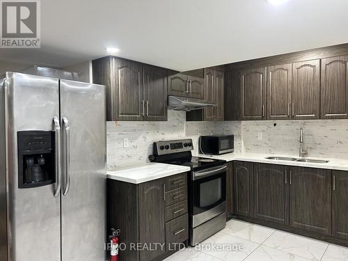 Bsmt - 6 Junetown Circle, Brampton, ON - Indoor Photo Showing Kitchen With Double Sink