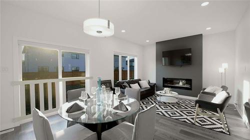 80 Cornerstone Heights, Winnipeg, MB - Indoor Photo Showing Dining Room With Fireplace