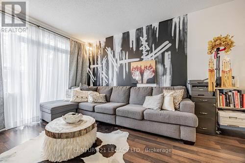 106 - 38 Joe Shuster Way, Toronto, ON - Indoor Photo Showing Living Room