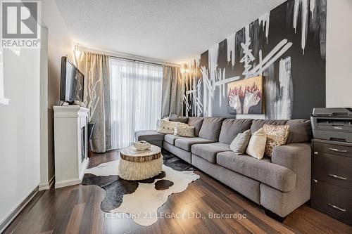 106 - 38 Joe Shuster Way, Toronto, ON - Indoor Photo Showing Living Room