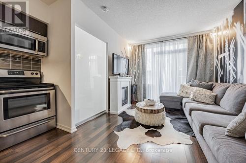 106 - 38 Joe Shuster Way, Toronto, ON - Indoor Photo Showing Kitchen With Stainless Steel Kitchen