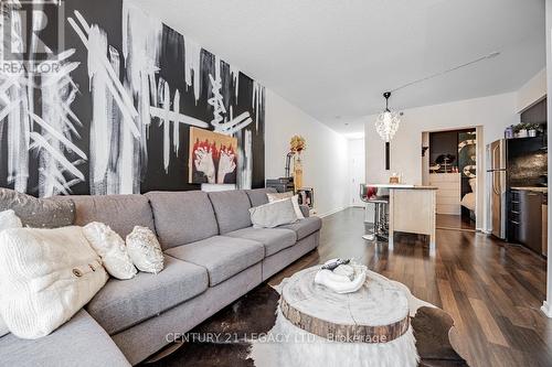 106 - 38 Joe Shuster Way, Toronto, ON - Indoor Photo Showing Living Room